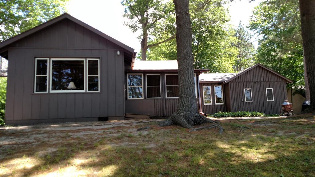 Log Cottage On Blue Lake Kalkaska Exterior foto